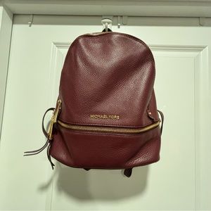 Michael Kors red burgundy leather Rhea backpack good condition